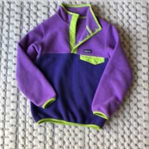 Patagonia fleece pullover in purple / green colors